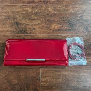 Red patent leather Stuart Weitzman clutch